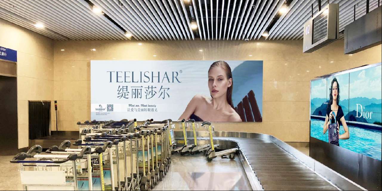 西藏林芝米林机场行李提取厅墙体灯箱广告
