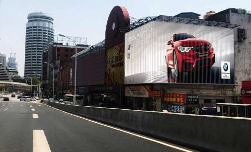 武汉市解放大道欢乐迪墙面三面翻广告媒体广告报价